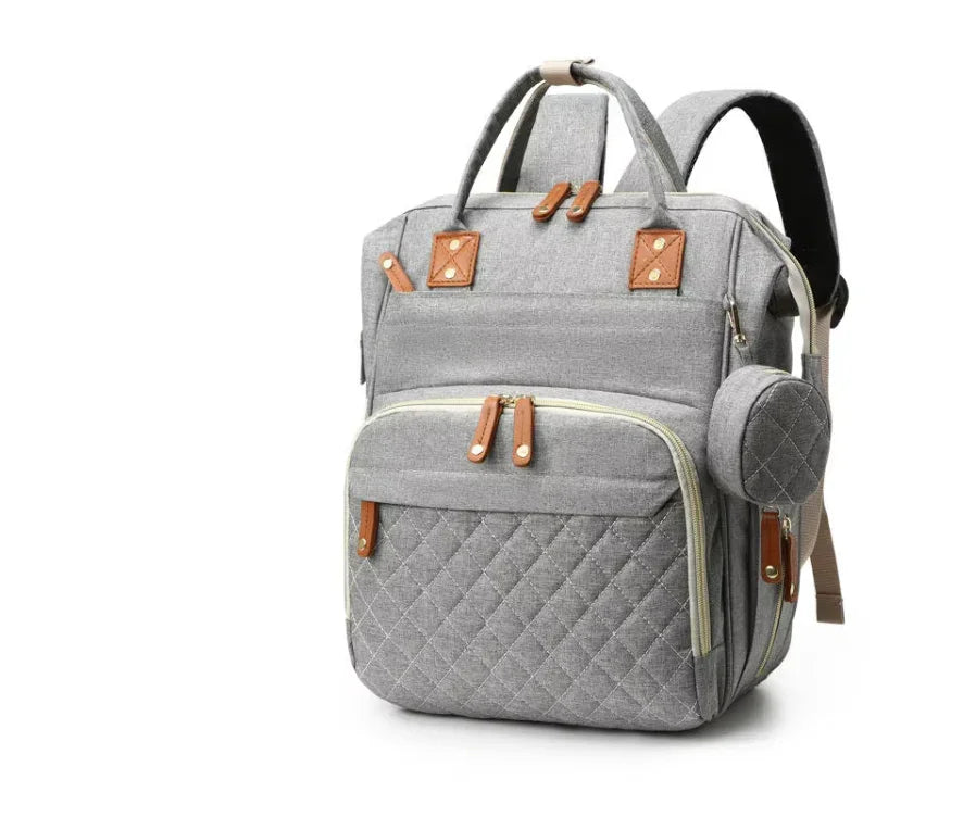 Lahbinii grey multipurpose diaper backpack with multiple pockets and adjustable straps, ideal for parents on the go.